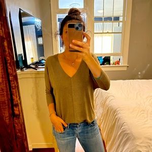 Olive green V-neck knit shirt